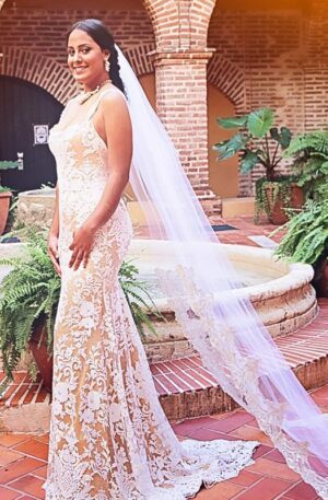 Fisgcut Wedding gown, unique lace gold bridal dress. bride in the court yard