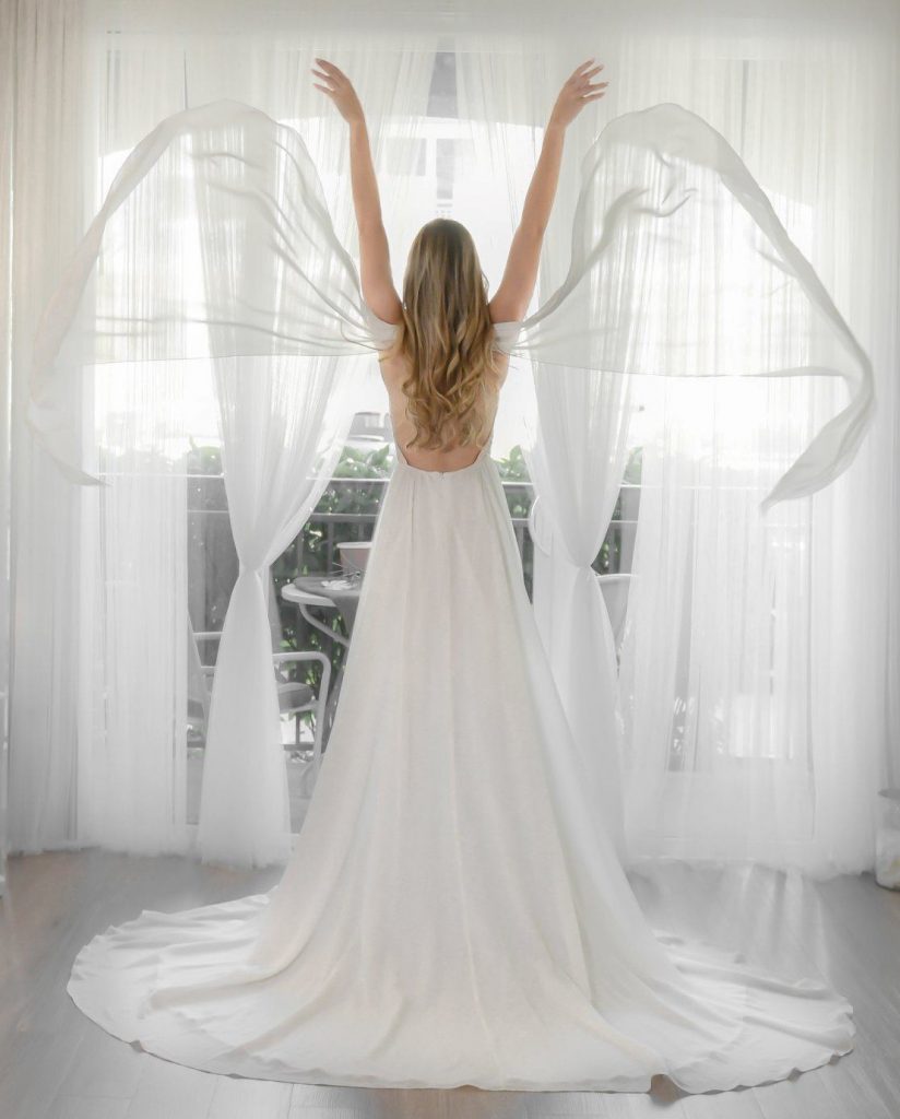 A bride trying on unique wedding dresses near Orlando, FL