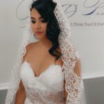 A bride wearing a veil with flower patterns on the edge (scaled)