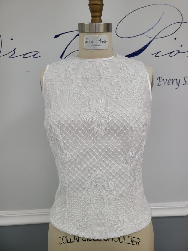 A beautiful Bridal lace Top, Wedding Separate displayed on a mannequin dummy.