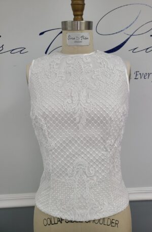 A beautiful Bridal lace Top, Wedding Separate displayed on a mannequin dummy.