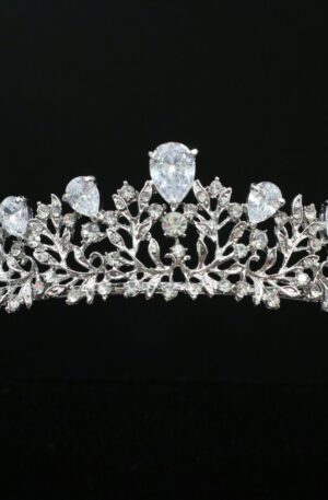 A white tiara with crystals on it.